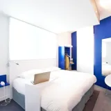 12856111